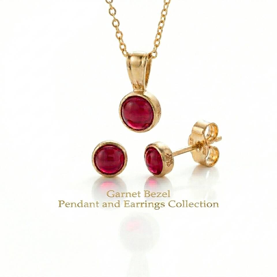 The Garnet Bezel Collection featuring the 100% Welsh gold pendant and matching stud earrings on a white background.