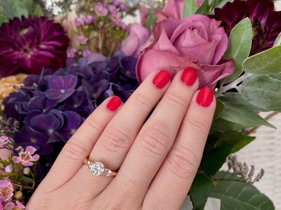 STEVE AND CHARLOTTE ENGAGEMENT RING ON HAND