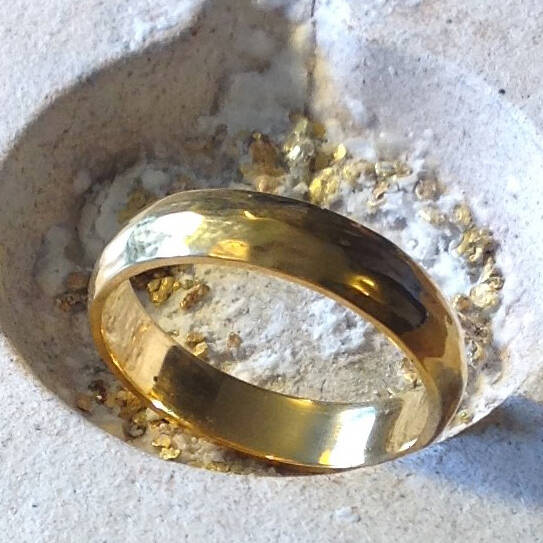 The Arthfael ring in rare Welsh Gold with a subtle hammered finish