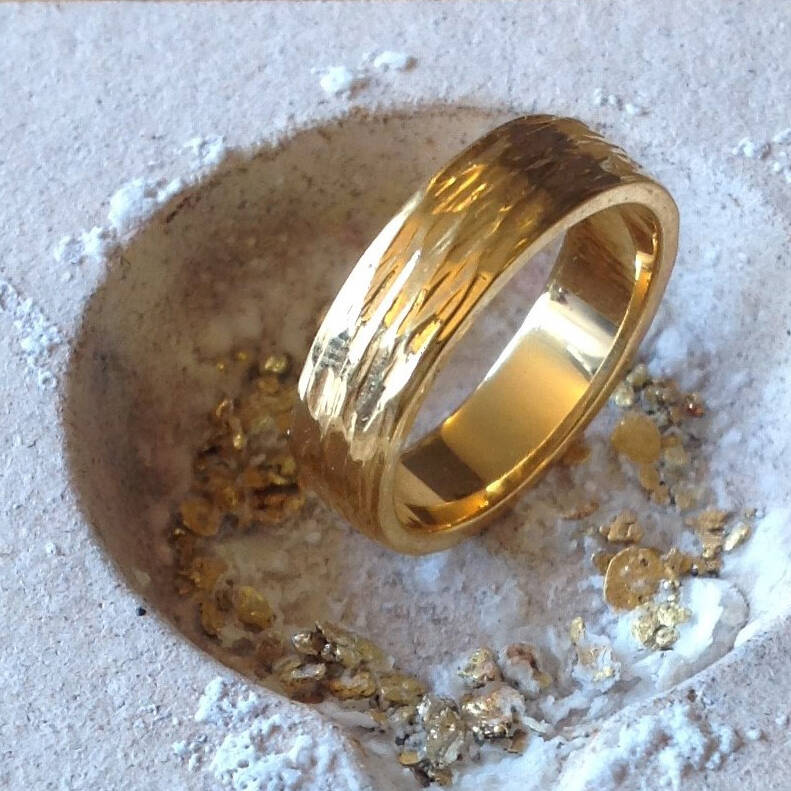 The Neave example ring in rare Welsh Gold with a distinctive hammered finish