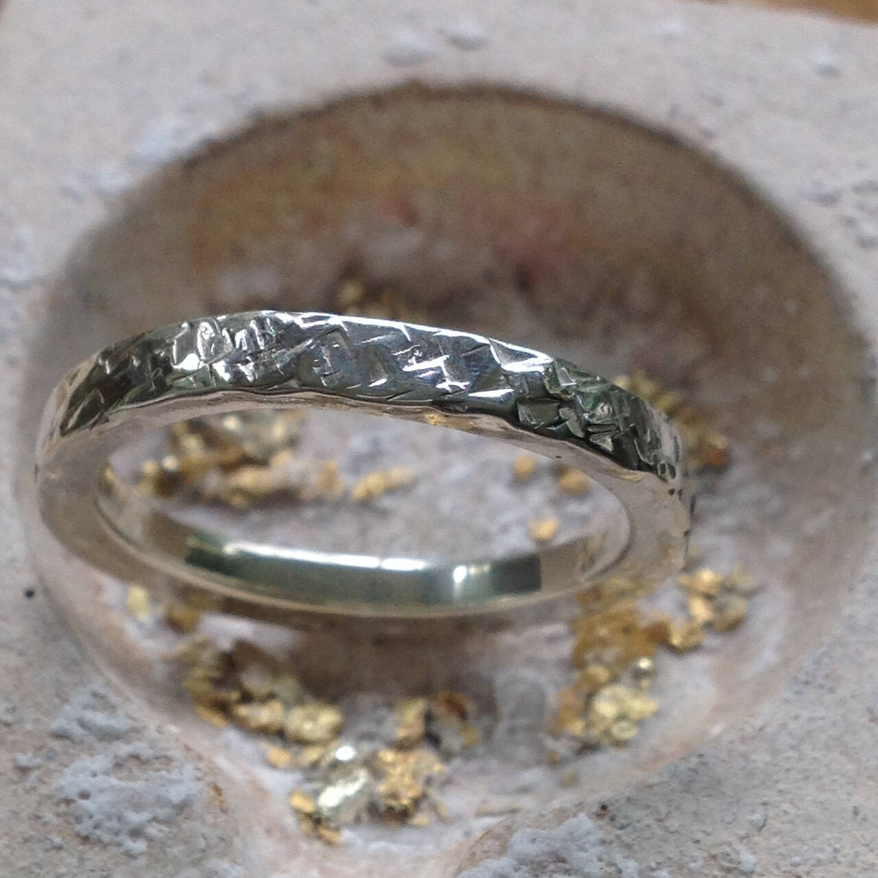 The Ninian ring in rare Welsh Gold with a distinctive hammered finish